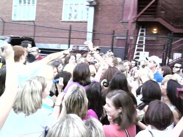 Dierks Bentley surrounded by fans