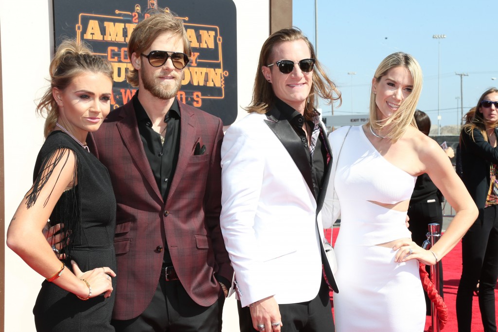 Florida Georgia Line's Brian Kelley and Tyler Hubbard with their wives Brittney Kelley and Hayley Hubbard; Photo by Frederick M. Brown/Getty Images