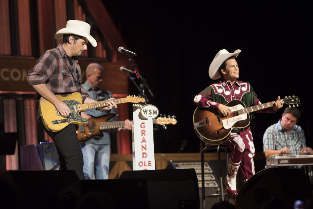 Pictured l-r: Brad Paisley, Little Jimmy Dickens figure; Photos By Chris Hollo/Grand Ole Opry