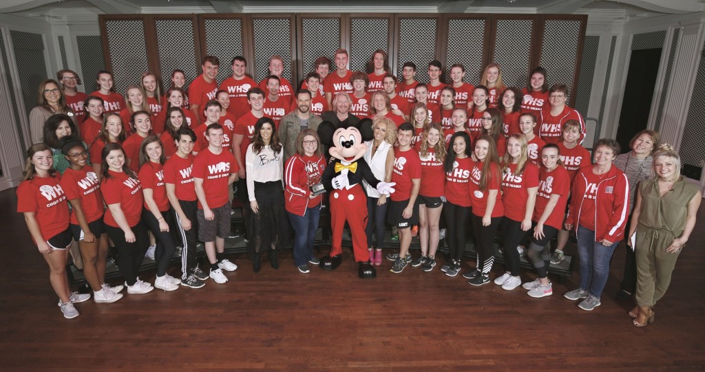 Students from Wadsworth High School, Ohio choir group, pose with five-time CMA Vocal Group of the Year Little Big Town and Mickey Mouse as they kick off Music In Our School Tour at Disney. (L-R)  Jane Mell Balek, Give a Note CEO; Terry Dola, Disney Performing Arts vice president; Karen Fairchild; Jimi Westbrook; Kalyn Davis, school choir director; Philip Sweet; Kimberly Schlapman; Sarah Trahern, CMA CEO; and Radio Disney Country correspondent, Savanah Keyes (far right); Photo Credit: Greg Newton 