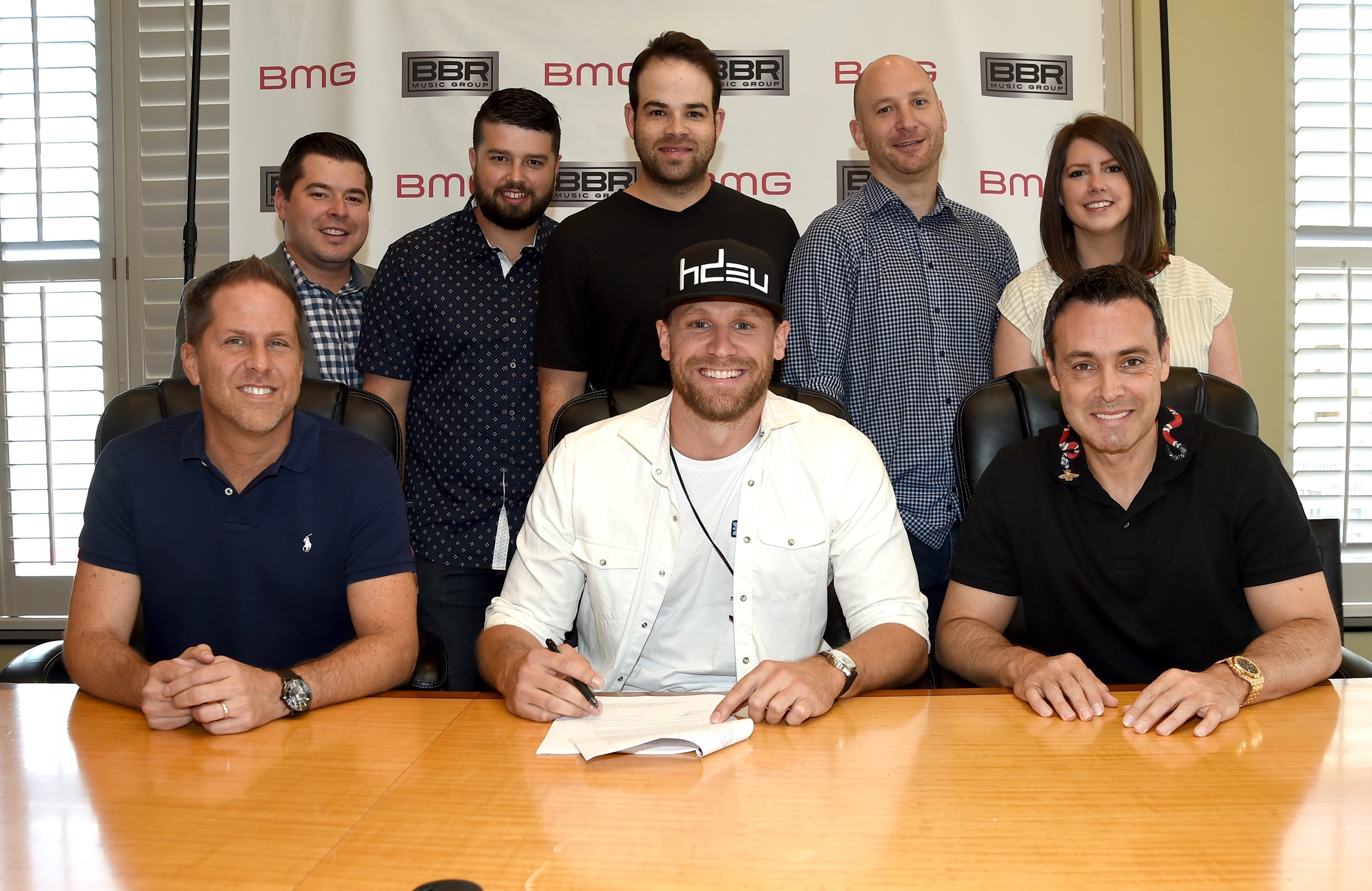 Photo - Back Row L-R: Colton McGee, Director, Legal and Financial Affairs BBR Music Group; Triple 8 Management's Eddie Kloesel, Bruce Kalmick and George Couri; and CAA's Meredith Jones; Photo - Front Row L-R: Jon Loba, EVP, BBR Music Group; Chase Rice; and Zach Katz, US Repertoire & Marketing, BMG; Photo Credit: Rick Diamond/Getty Images