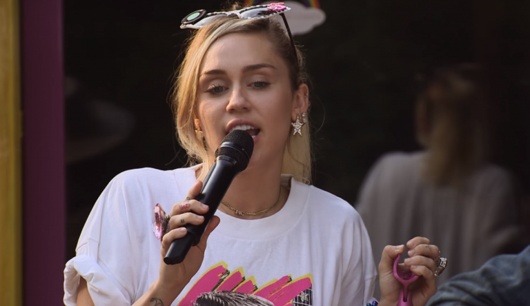 Miley Cyrus Returns to Country Roots With Twangy Version of ‘Party in the U.S.A.’