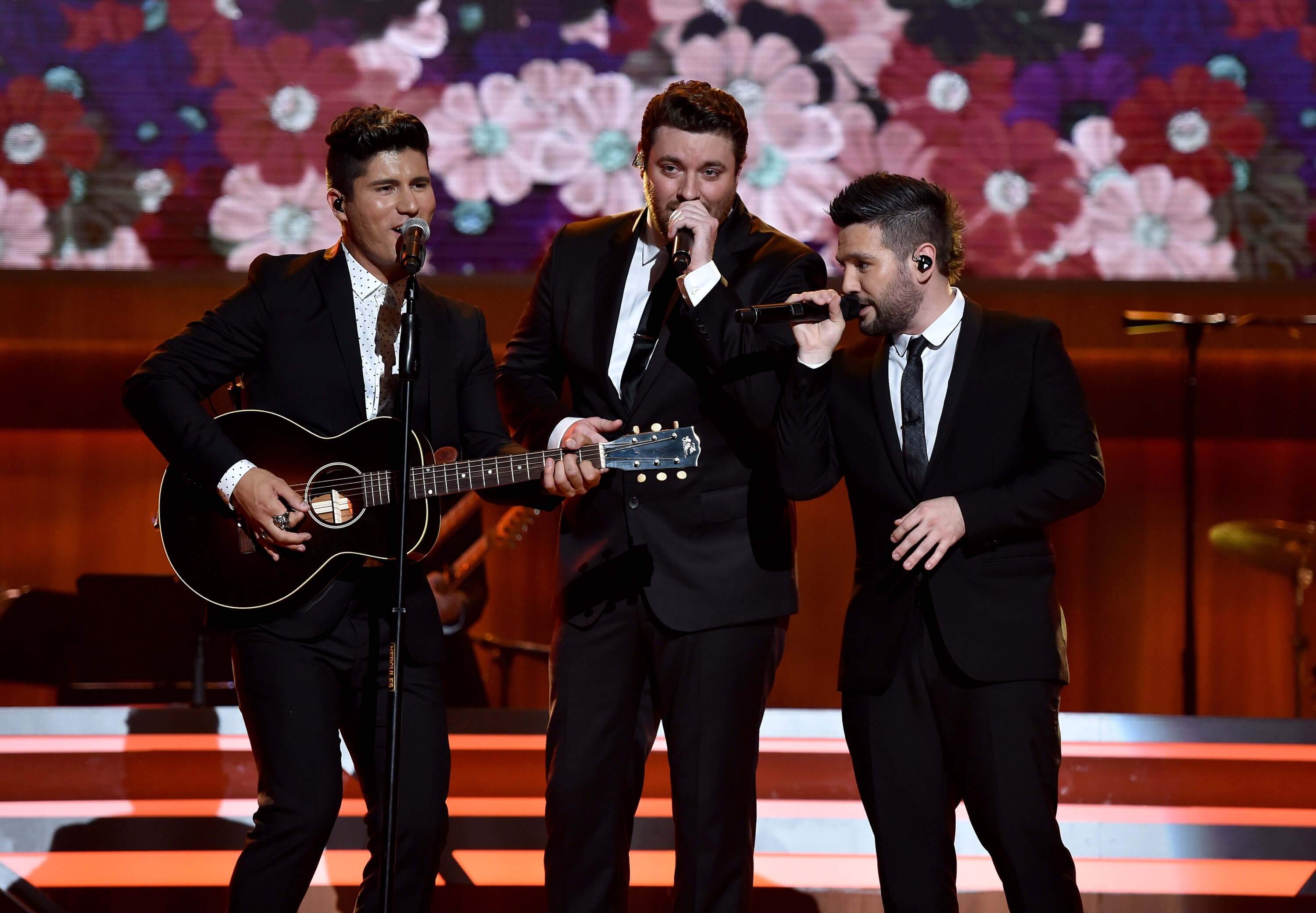 NASHVILLE, TN - AUGUST 30: Musical artists Dan Smyers from musical group Dan + Shay, Chris Young and Shay Mooney from musicial group Dan+ Shay perform onstage during the 10th Annual ACM Honors at the Ryman Auditorium on August 30, 2016 in Nashville, Tennessee. (Photo by John Shearer/Getty Images for ACM)