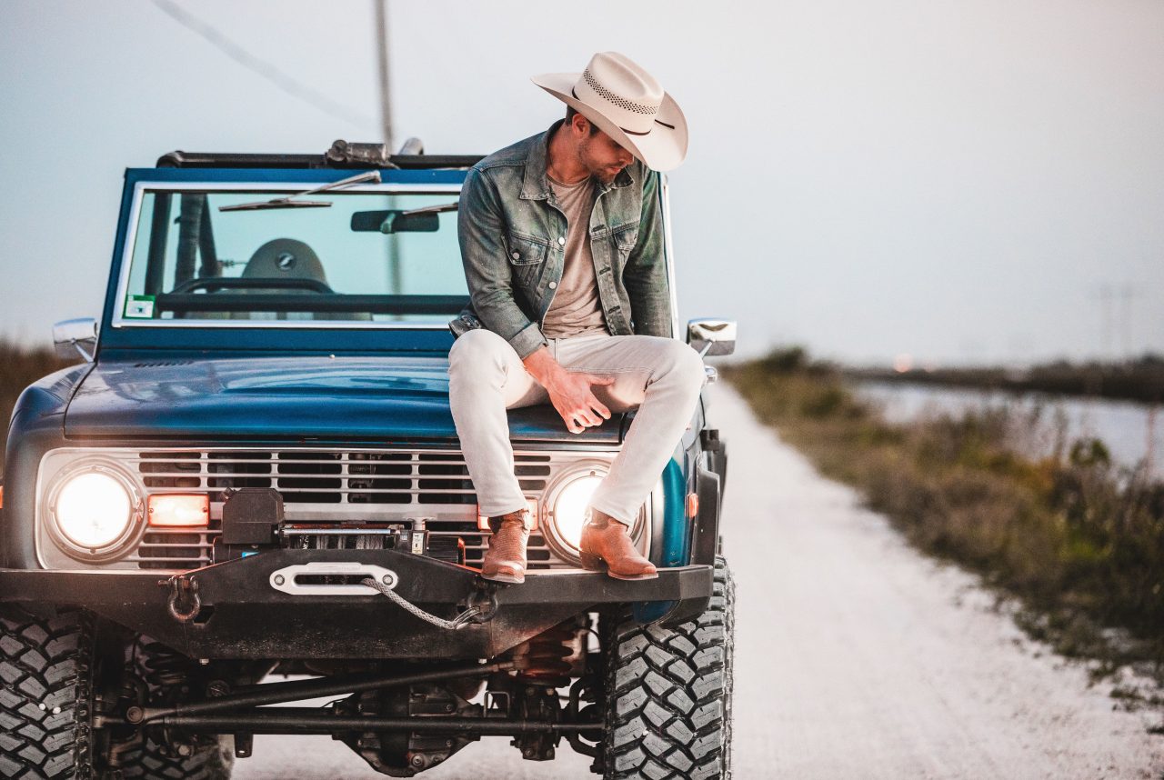 Dustin Lynch Takes a Steamy Visual Thrill Ride in ‘Ridin’ Roads’ Video