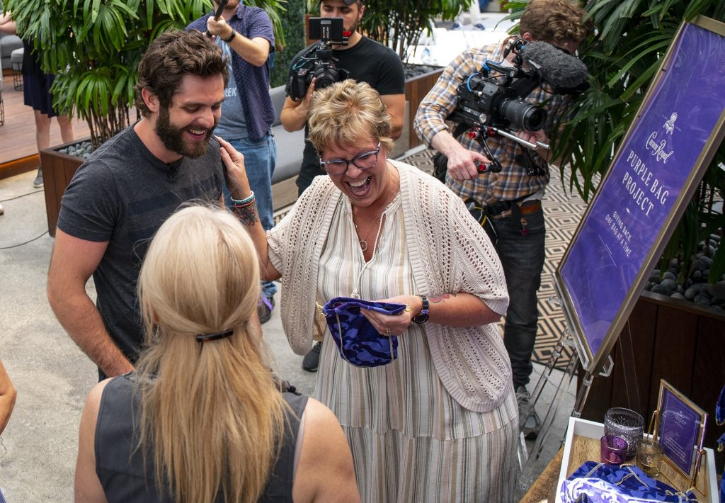Thomas Rhett and Crowl Royal's M.O.M. Medal Surprise; Photo courtesy of Crown Royal/Taylor Strategy