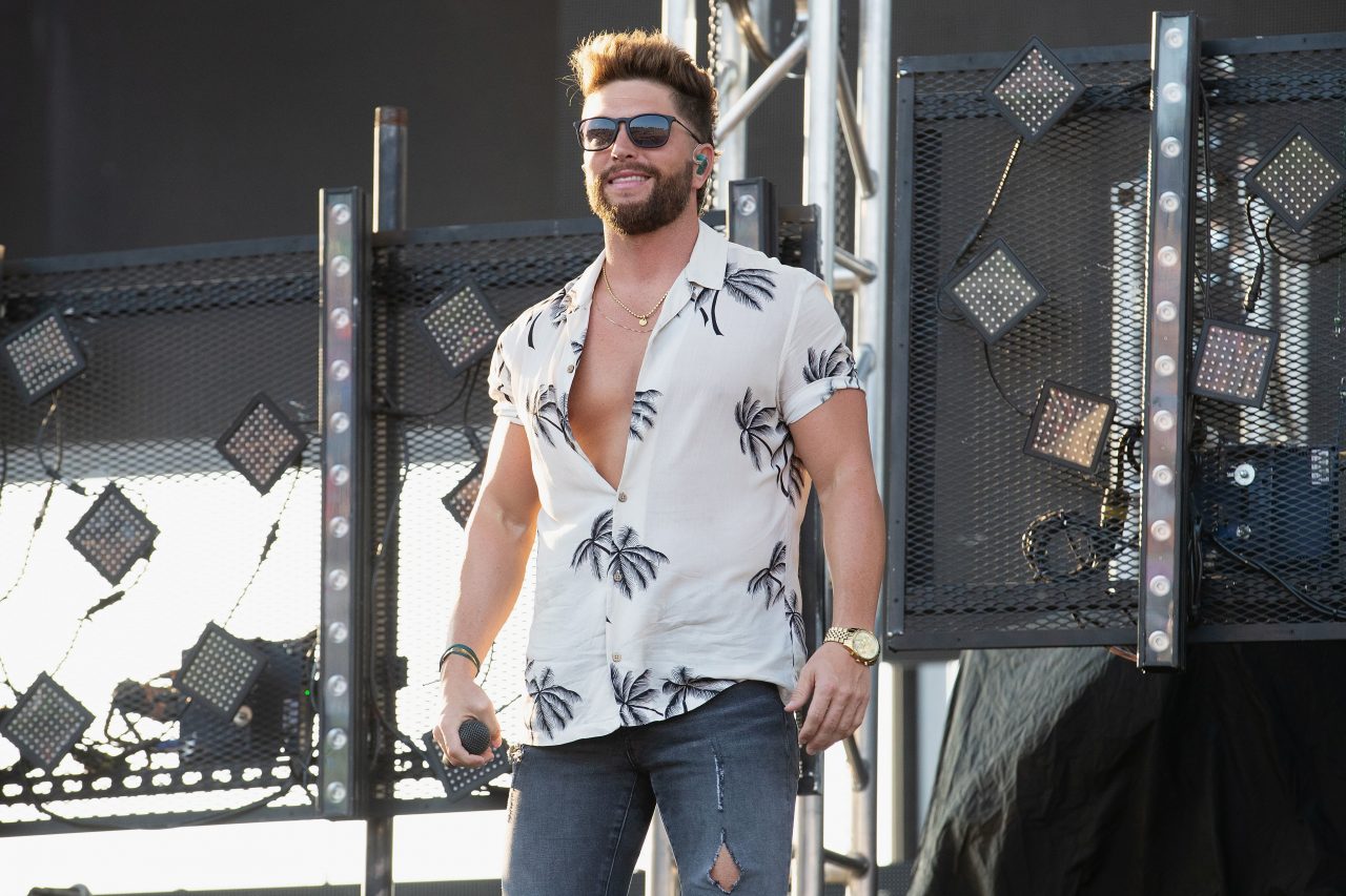 Chris Lane Is “Fishin'” for Love in Beachy New Video