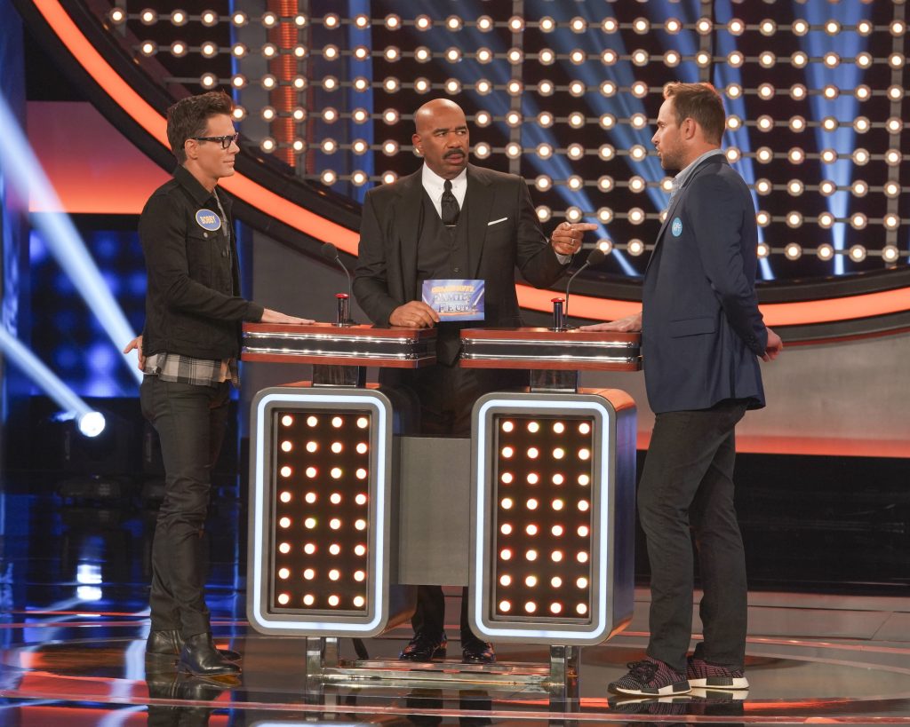 CELEBRITY FAMILY FEUD - "Brooklyn Decker & Andy Roddick vs. Bobby Bones and Tara Lipinski vs. Johnny Weir" - Actress and tech entrepreneur Brooklyn Decker and her husband, Andy Roddick, a former world No. 1 professional tennis player, will compete against nationally syndicated on-air personality Bobby Bones, who has previously been seen on Season 2 of ABC's "American Idol" as the official in-house mentor and was season 27 "Dancing with the Stars" Champion, to win cash for their charities. The next game of the night features Olympic figure skater Tara Lipinski facing off against two-time Olympic figure skater Johnny Weir, along with members of their respective families on a star-studded episode of "Celebrity Family Feud," airing SUNDAY, JULY 21 (8:00-9:00 p.m. EDT), on ABC. (ABC/Byron Cohen) BOBBY BONES, STEVE HARVEY, ANDY RODDICK