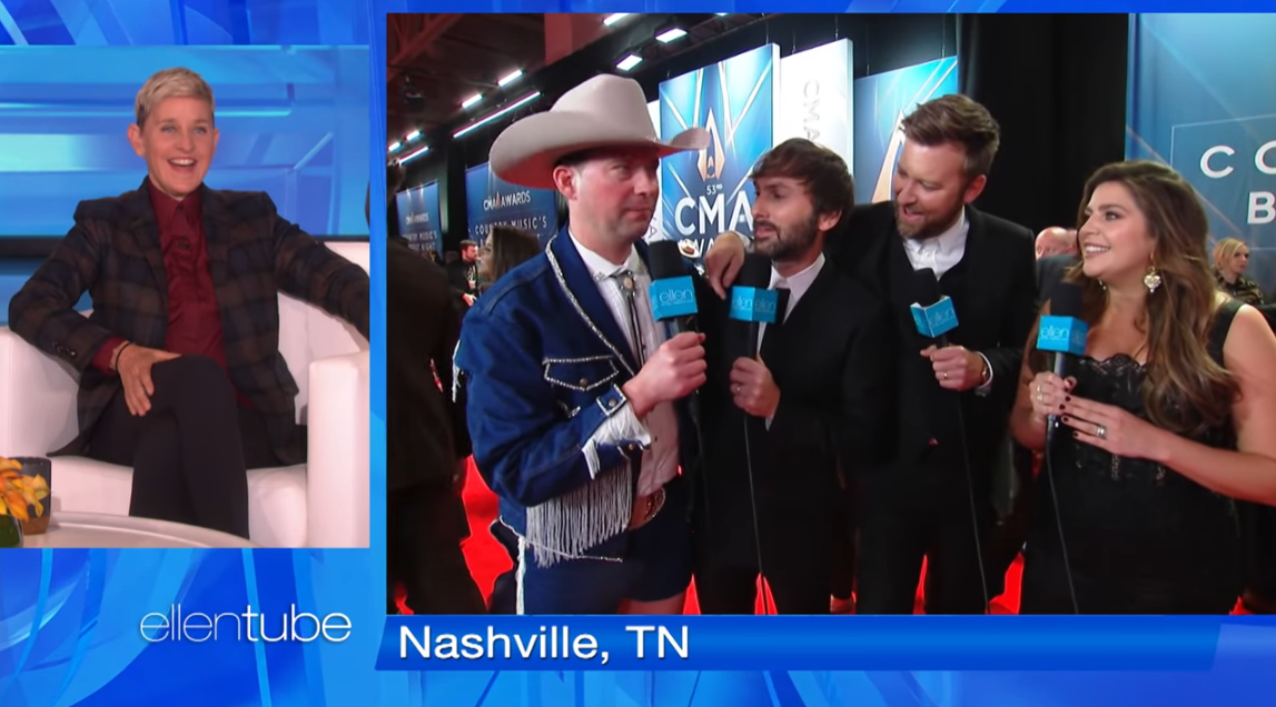 ‘Ellen’ Producer Takes Over the CMA Awards Red Carpet