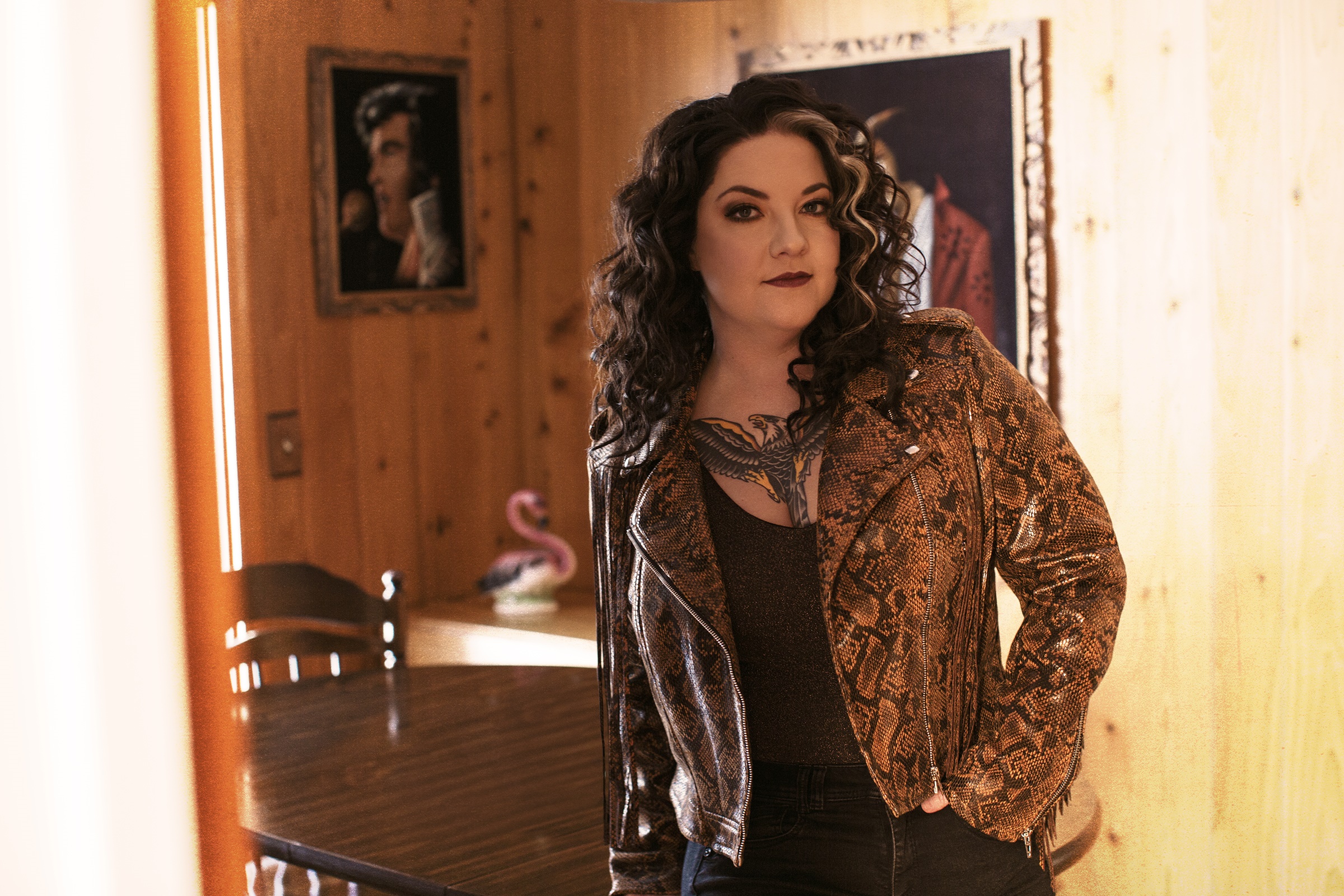 5. Ashley McBryde's Chest Tattoo: A Tribute to Her Roots - wide 2