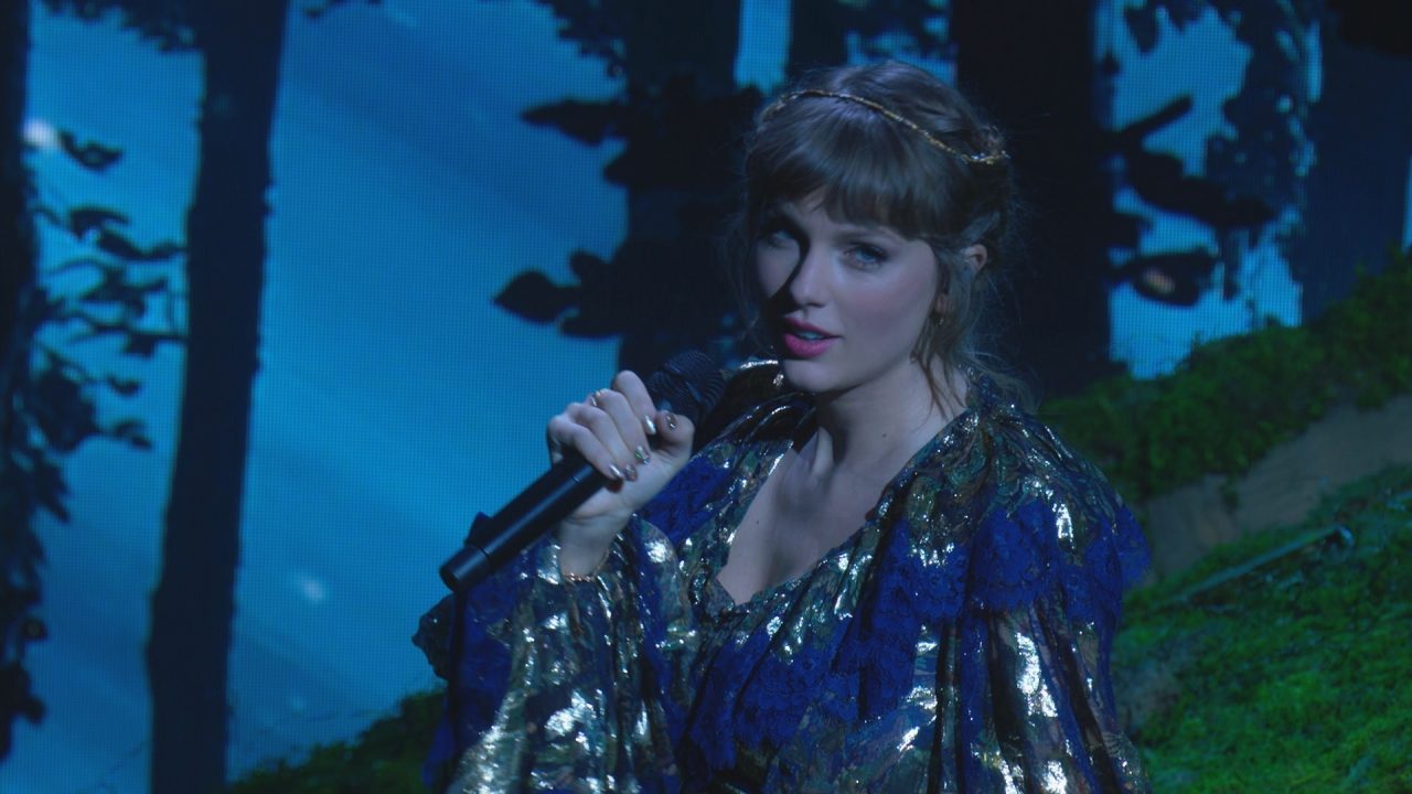 Taylor Swift Captivates with ‘folklore’ and ‘evermore’ Medley at 2021 GRAMMYs